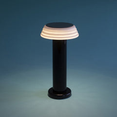 PL1 Portable Table Light Black-White with a black base and white lampshade, designed by George Sowden.