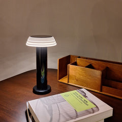 PL1 Portable Table Light Black-White with a black base and white lampshade, designed by George Sowden.