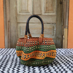 Baba Tree handwoven Stay Flow Basket Handbag 00004 with black handle, made of elephant grass in Ghana