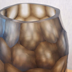 Sunhive Vase 33cm in warm smoky taupe frosted glass, its surface covered in large rounded organic cells that ripple upward like honeycomb lit from within.