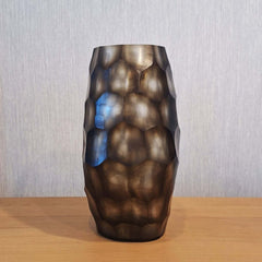 Sunhive Vase 33cm in warm smoky taupe frosted glass, its surface covered in large rounded organic cells that ripple upward like honeycomb lit from within.