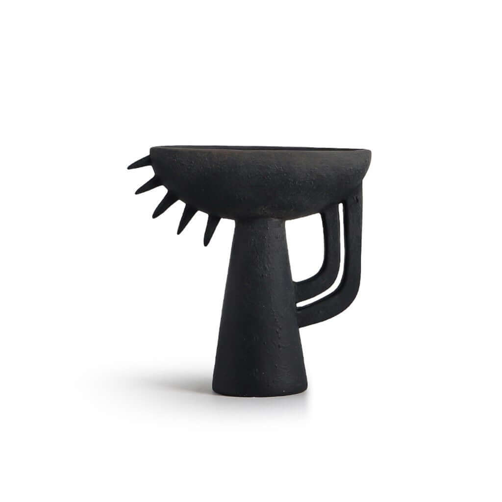 A ceramic Theodore Vase Black with an abstract and geometric shape