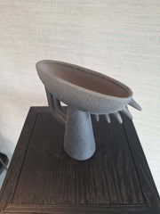 A ceramic Theodore Vase Black with an abstract and geometric shape