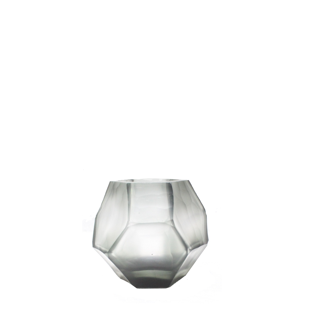 Tundra Tealight Holder 9cm in cool silver-grey frosted glass, its geometric facets casting a soft, fractured glow when lit from within.