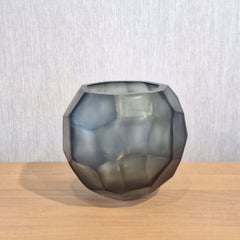Tundra Vase 18cm in cool silver-grey frosted glass, with bold geometric facets that give it the dense, grounded presence of a glacial boulder.