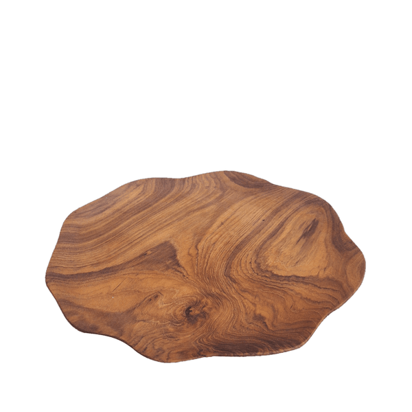 Handcrafted Wavy Plate Small Teak with a free-form edge and striking natural grain. A versatile piece for table styling, serving, or display in any interior.