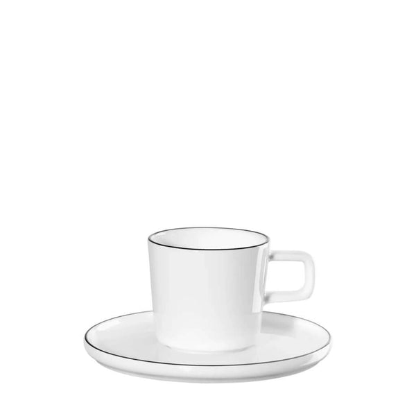 A white fine bone china espresso cup with a hand-painted black line design, accompanied by a matching white saucer, by ASA selection