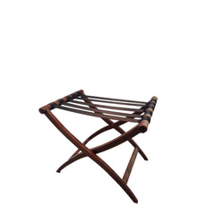 A solid walnut luggage rack with heavy duty nylon straps, foldable design.
