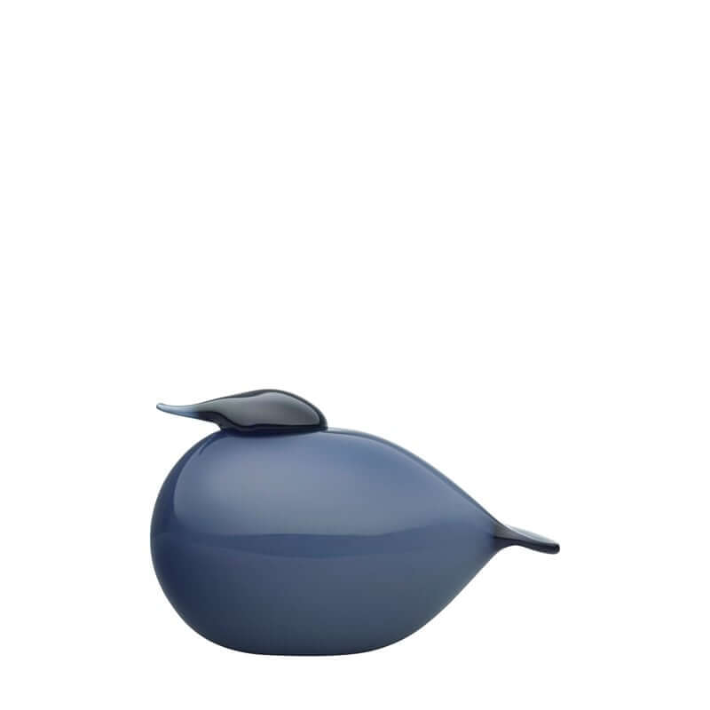 Birds By Toikka Kuulas Rain is a mouth-blown glass figurine with a blue rain-colored finish, designed to resemble a bird with a flat tail and teardrop head.