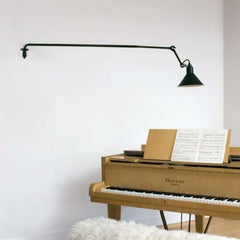 Lampe Gras 213 Wall Lamp Black with a long arm and a hanging bulb.