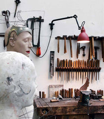 Lampe Gras 203 Wall Lamp Red in a workshop