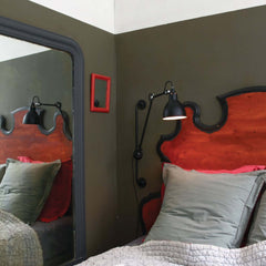 Lampe Gras 210 Wall Lamp Red in a bedroom
