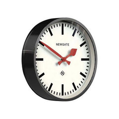 Luggage Wall Clock Black with red hands and white marker dial, branded 'NEWGATE'.