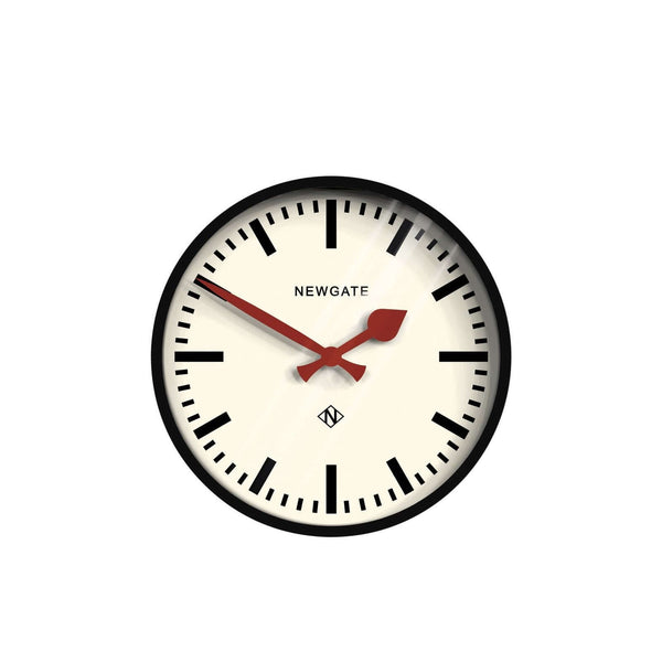 Luggage Wall Clock Black with red hands and white marker dial, branded 'NEWGATE'.