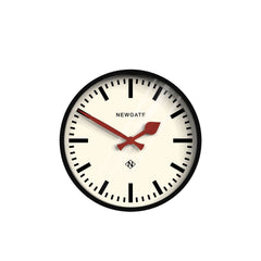 Luggage Wall Clock Black with red hands and white marker dial, branded 'NEWGATE'.