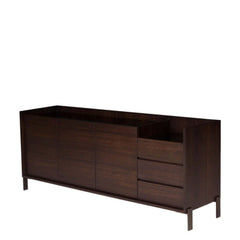 A dark brown Mora Sideboard with three doors on the left side and three drawers on the right side, made of smoked eucalyptus veneer on mdf with a glass top and stainless steel base.