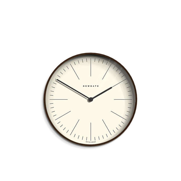 Newgate Mr Clarke Wall Clock Dark Wood with a linear marker dial, metal hands, and a glass lens.