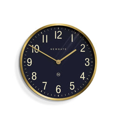 Newgate Mr Edwards Wall Clock Brass with a black background, gold numbers, and a gold metal case.