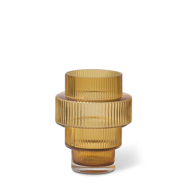 A conical amber-colored glass candle holder with vertical ridges, featuring an intricate and textured design, by Pols Potten