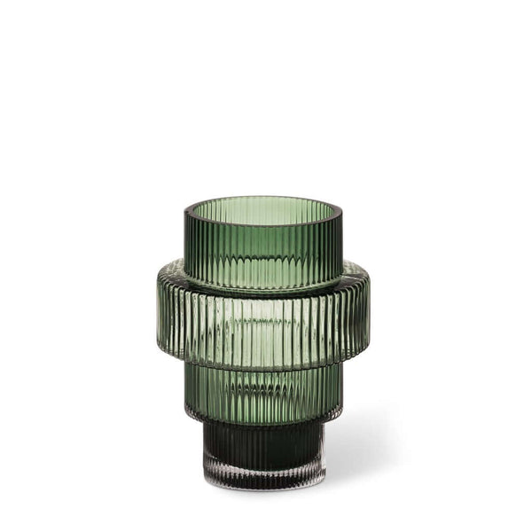 A conical green-colored glass candle holder with vertical ridges, featuring an intricate and textured design, by Pols Potten