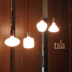 A family of porcelain LED bulb with a matte glass finish, emitting a soft white light, designed to screw into an Edison-style base, by Tala