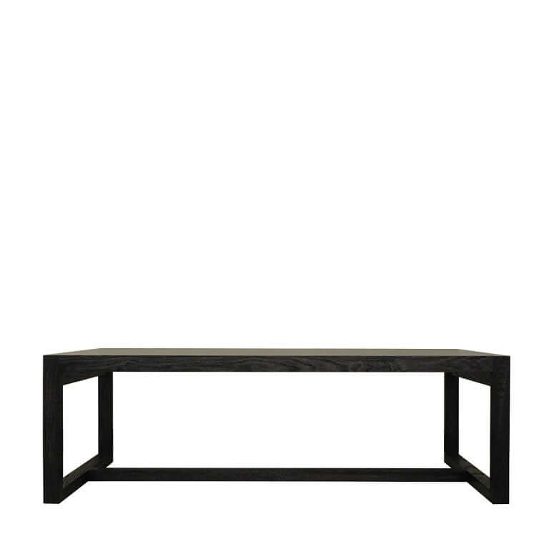 A Tas coffee table with a glass top and charcoal-colored solid ash wood legs