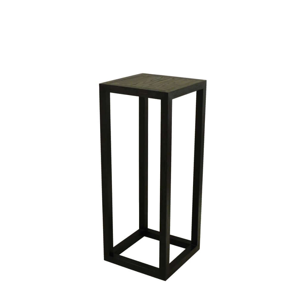 Tipis Pedestal Medium Ash made of solid ash wood with an open pore finish in charcoal color, designed to display vases, plants, or sculptures.