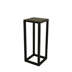 Tipis Pedestal Medium Ash made of solid ash wood with an open pore finish in charcoal color, designed to display vases, plants, or sculptures.