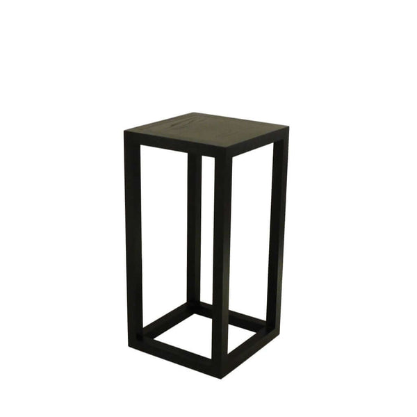 Tipis Pedestal Small Ash made of solid ash wood with an open pore finish in charcoal color, designed to display vases, plants, or sculptures.